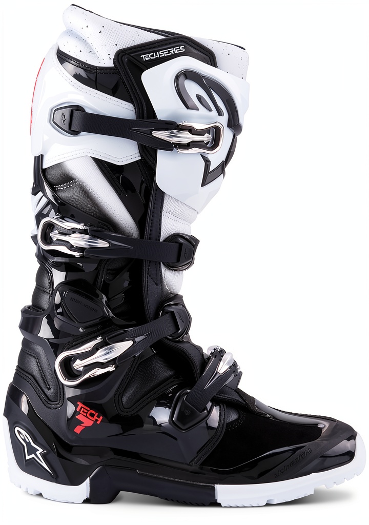 Rider wearing Pavo enduro boots on a muddy trail
